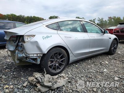 Trzecie zdjęcie samochodu z tyłu: 2018 TESLA MODEL 3 VIN:5YJ3E1EA2JF016564 - miniatura