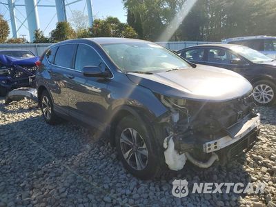 Czwarte zdjęcie samochodu z boku: 2017 HONDA CR-V LX VIN:2HKRW2H23HH119053 - miniatura