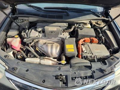Zdjęcie 11 z 12 samochodu: 2014 TOYOTA CAMRY HYBRID XLE VIN:4T1BD1FK0EU136202 - miniatura