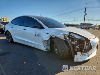 Czwarte zdjęcie samochodu z boku: 2022 TESLA MODEL 3 VIN:5YJ3E1EA2NF111731 - miniatura