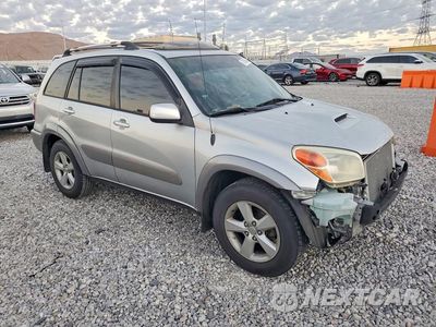 Czwarte zdjęcie samochodu z boku: 2004 TOYOTA RAV4 BASE VIN:JTEGD20V540041400 - miniatura