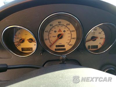 Zdjęcie 9 z 12 samochodu: 2001 MERCEDES-BENZ SLK 320 VIN:WDBKK65F01F197946 - miniatura