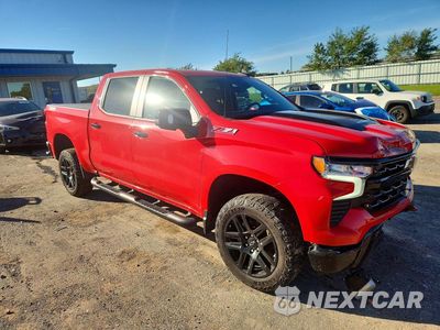 Czwarte zdjęcie samochodu z boku: 2022 CHEVROLET SILVERADO K1500 LT TRAIL BOSS VIN:3GCUDFED6NG590292 - miniatura