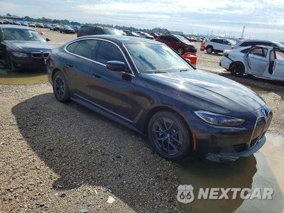 Czwarte zdjęcie samochodu z boku: 2024 BMW I4 EDRIVE 35 VIN:WBY43AW05RFR55911 - miniatura