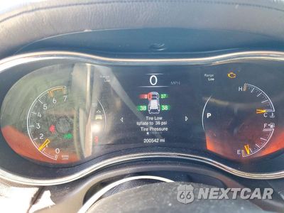 Zdjęcie 9 z 13 samochodu: 2014 JEEP GRAND CHEROKEE OVERLAND VIN:1C4RJFCTXEC192093 - miniatura