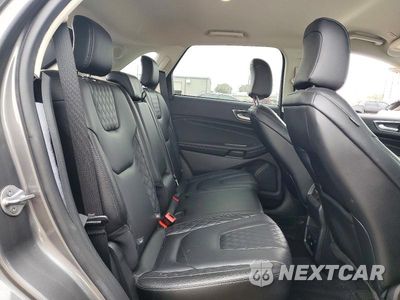 Zdjęcie 11 z 13 samochodu: 2023 FORD EDGE TITANIUM VIN:2FMPK4K96PBA21841 - miniatura