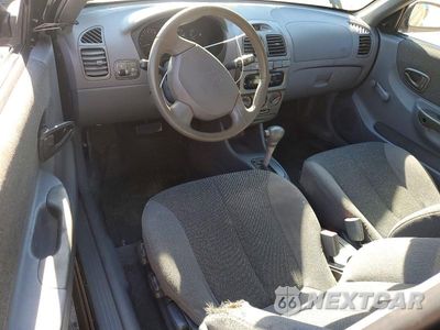 Zdjęcie 8 z 12 samochodu: 2000 HYUNDAI ACCENT GS VIN:KMHCG35G2YU056845 - miniatura