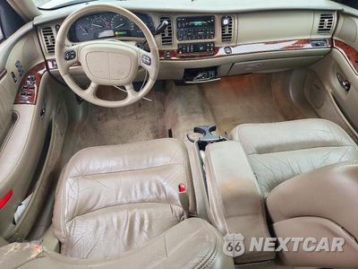 Zdjęcie 8 z 12 samochodu: 1999 BUICK PARK AVENUE ULTRA VIN:1G4CU5215X4628896 - miniatura