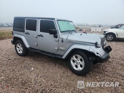 Czwarte zdjęcie samochodu z boku: 2015 JEEP WRANGLER UNLIMITED SAHARA VIN:1C4BJWEG9FL693818 - miniatura
