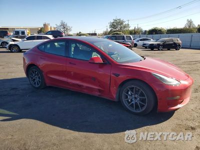 Czwarte zdjęcie samochodu z boku: 2023 TESLA MODEL 3 VIN:5YJ3E1EA0PF714549 - miniatura