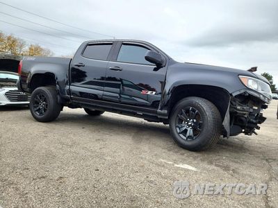 Czwarte zdjęcie samochodu z boku: 2017 CHEVROLET COLORADO Z71 VIN:1GCGTDEN2H1301148 - miniatura