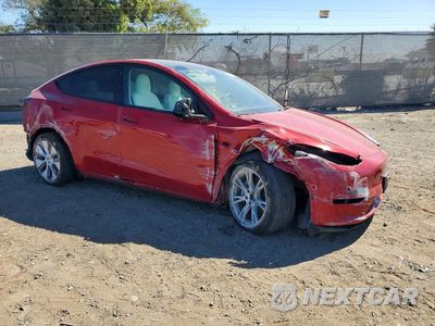 Czwarte zdjęcie samochodu z boku: 2022 TESLA MODEL Y VIN:7SAYGDEE6NF342154 - miniatura