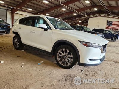 Czwarte zdjęcie samochodu z boku: 2019 MAZDA CX-5 GRAND TOURING VIN:JM3KFBDM7K0643150 - miniatura