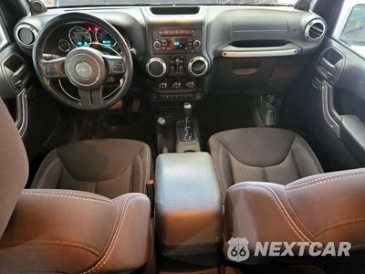 Zdjęcie 8 z 12 samochodu: 2013 JEEP WRANGLER UNLIMITED SAHARA VIN:1C4BJWEG9DL619702 - miniatura