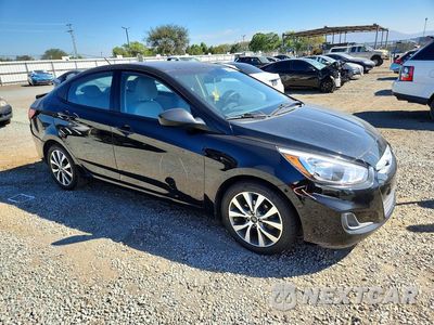 Czwarte zdjęcie samochodu z boku: 2017 HYUNDAI ACCENT VALUE EDITION VIN:KMHCT4AE6HU388504 - miniatura