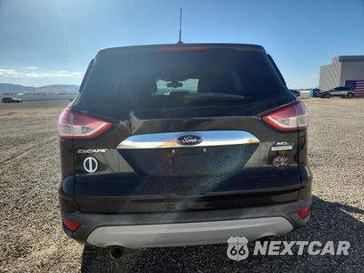 Zdjęcie 6 z 13 samochodu: 2013 FORD ESCAPE SEL VIN:1FMCU0HX5DUC47401 - miniatura