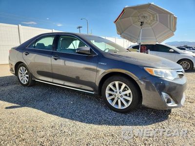 Czwarte zdjęcie samochodu z boku: 2012 TOYOTA CAMRY HYBRID XLE VIN:4T1BD1FK0CU063104 - miniatura