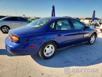 Trzecie zdjęcie samochodu z tyłu: 1997 FORD TAURUS GL VIN:1FALP52UXVG208347 - miniatura