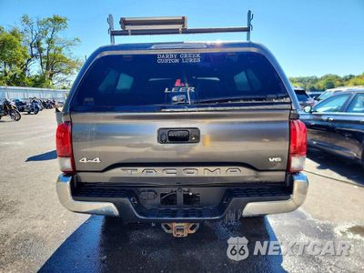 Zdjęcie 6 z 13 samochodu: 2017 TOYOTA TACOMA SR5 V6 VIN:3TMDZ5BN7HM029579 - miniatura