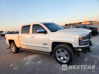 Czwarte zdjęcie samochodu z boku: 2018 CHEVROLET SILVERADO K1500 HIGH COUNTRY VIN:3GCUKTEJ2JG122208 - miniatura
