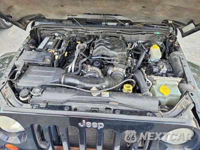 Zdjęcie 11 z 12 samochodu: 2012 JEEP WRANGLER UNLIMITED SAHARA VIN:1C4BJWEG5CL173448 - miniatura