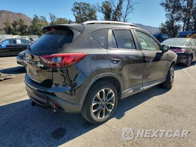 Trzecie zdjęcie samochodu z tyłu: 2016 MAZDA CX-5 GT VIN:JM3KE4DY0G0749951 - miniatura