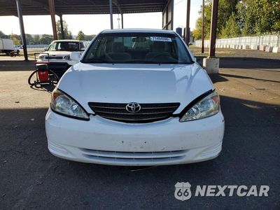 Piąte zdjęcie samochodu w środku: 2003 TOYOTA CAMRY LE VIN:JTDBE32KX30173328 - miniatura