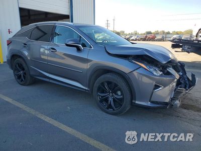 Czwarte zdjęcie samochodu z boku: 2017 LEXUS RX 450H BASE VIN:2T2BGMCA6HC012652 - miniatura