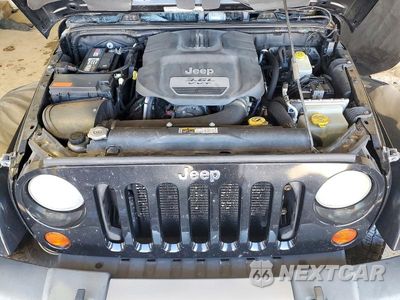 Zdjęcie 12 z 13 samochodu: 2012 JEEP WRANGLER UNLIMITED SAHARA VIN:1C4BJWEG5CL276093 - miniatura