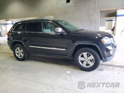 Czwarte zdjęcie samochodu z boku: 2013 JEEP GRAND CHEROKEE LAREDO VIN:1C4RJFAGXDC650106 - miniatura