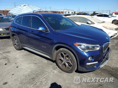 Czwarte zdjęcie samochodu z boku: 2016 BMW X1 XDRIVE28I VIN:WBXHT3C32G5E52729 - miniatura