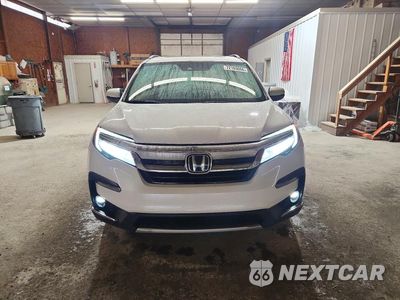 Piąte zdjęcie samochodu w środku: 2020 HONDA PILOT TOURING VIN:5FNYF6H60LB034264 - miniatura