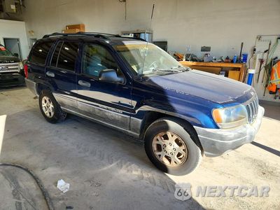 Czwarte zdjęcie samochodu z boku: 2000 JEEP GRAND CHEROKEE LAREDO VIN:1J4GW48S9YC239562 - miniatura