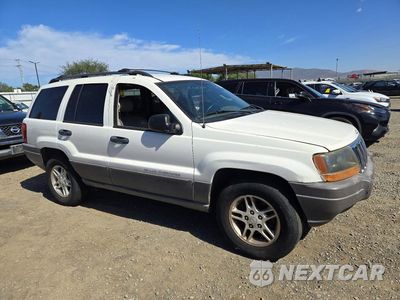 Czwarte zdjęcie samochodu z boku: 2003 JEEP GRAND CHEROKEE LAREDO VIN:1J4GX48S53C550928 - miniatura