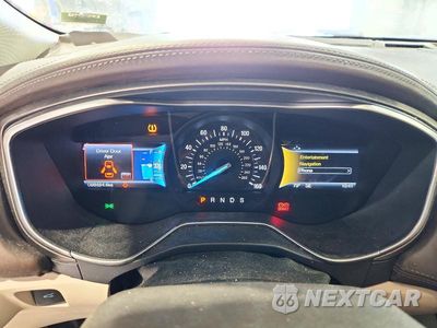 Zdjęcie 9 z 12 samochodu: 2017 FORD FUSION TITANIUM VIN:3FA6P0K90HR157949 - miniatura