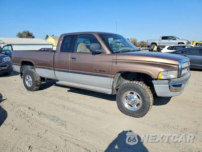 Czwarte zdjęcie samochodu z boku: 2001 DODGE RAM 2500 VIN:1B7KF23W81J562341 - miniatura