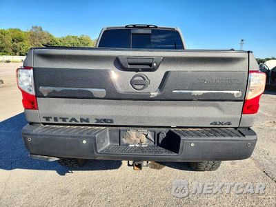 Zdjęcie 6 z 12 samochodu: 2017 NISSAN TITAN XD PLATINUM RESERVE VIN:1N6AA1F42HN514123 - miniatura
