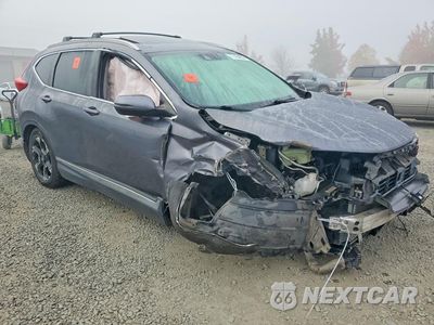 Czwarte zdjęcie samochodu z boku: 2017 HONDA CR-V TOURING VIN:2HKRW2H92HH638415 - miniatura