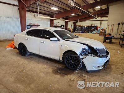 Czwarte zdjęcie samochodu z boku: 2015 LINCOLN MKS VIN:1LNHL9FT8FG600759 - miniatura