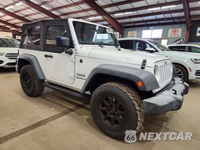 Czwarte zdjęcie samochodu z boku: 2016 JEEP WRANGLER SPORT VIN:1C4AJWAG4GL187445 - miniatura