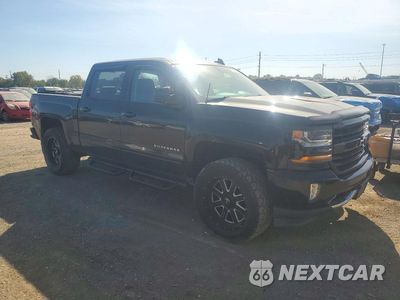 Czwarte zdjęcie samochodu z boku: 2018 CHEVROLET SILVERADO K1500 LT VIN:3GCUKRECXJG521520 - miniatura