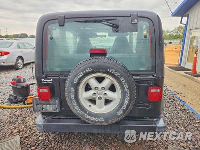 Zdjęcie 6 z 13 samochodu: 2001 JEEP WRANGLER / TJ SPORT VIN:1J4FA49S11P324080 - miniatura