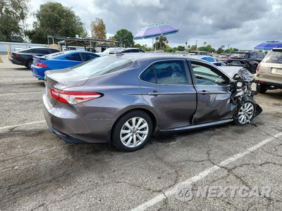 Trzecie zdjęcie samochodu z tyłu: 2020 TOYOTA CAMRY LE VIN:4T1C11AKXLU991538 - miniatura