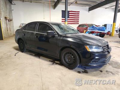 Czwarte zdjęcie samochodu z boku: 2017 VOLKSWAGEN JETTA S VIN:3VW2B7AJ5HM401066 - miniatura