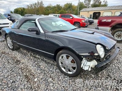 Czwarte zdjęcie samochodu z boku: 2002 FORD THUNDERBIRD VIN:1FAHP60A22Y117938 - miniatura