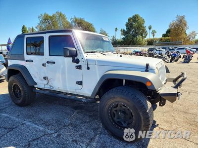 Czwarte zdjęcie samochodu z boku: 2014 JEEP WRANGLER UNLIMITED SPORT VIN:1C4BJWDG2EL317476 - miniatura