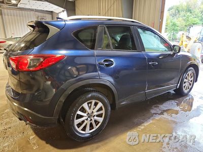 Trzecie zdjęcie samochodu z tyłu: 2016 MAZDA CX-5 TOURING VIN:JM3KE4CY3G0887100 - miniatura