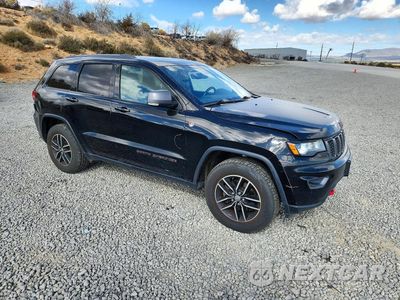 Czwarte zdjęcie samochodu z boku: 2017 JEEP GRAND CHEROKEE TRAILHAWK VIN:1C4RJFLG2HC866499 - miniatura