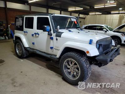 Czwarte zdjęcie samochodu z boku: 2015 JEEP WRANGLER UNLIMITED SAHARA VIN:1C4HJWEG5FL621671 - miniatura