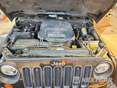 Zdjęcie 12 z 13 samochodu: 2013 JEEP WRANGLER UNLIMITED SAHARA VIN:1C4HJWEG6DL627217 - miniatura